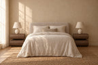 Pair of walnut stacked bedside tables on each side of a double bed