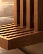 Close-up detail of the walnut fold-down wall bedside shelf