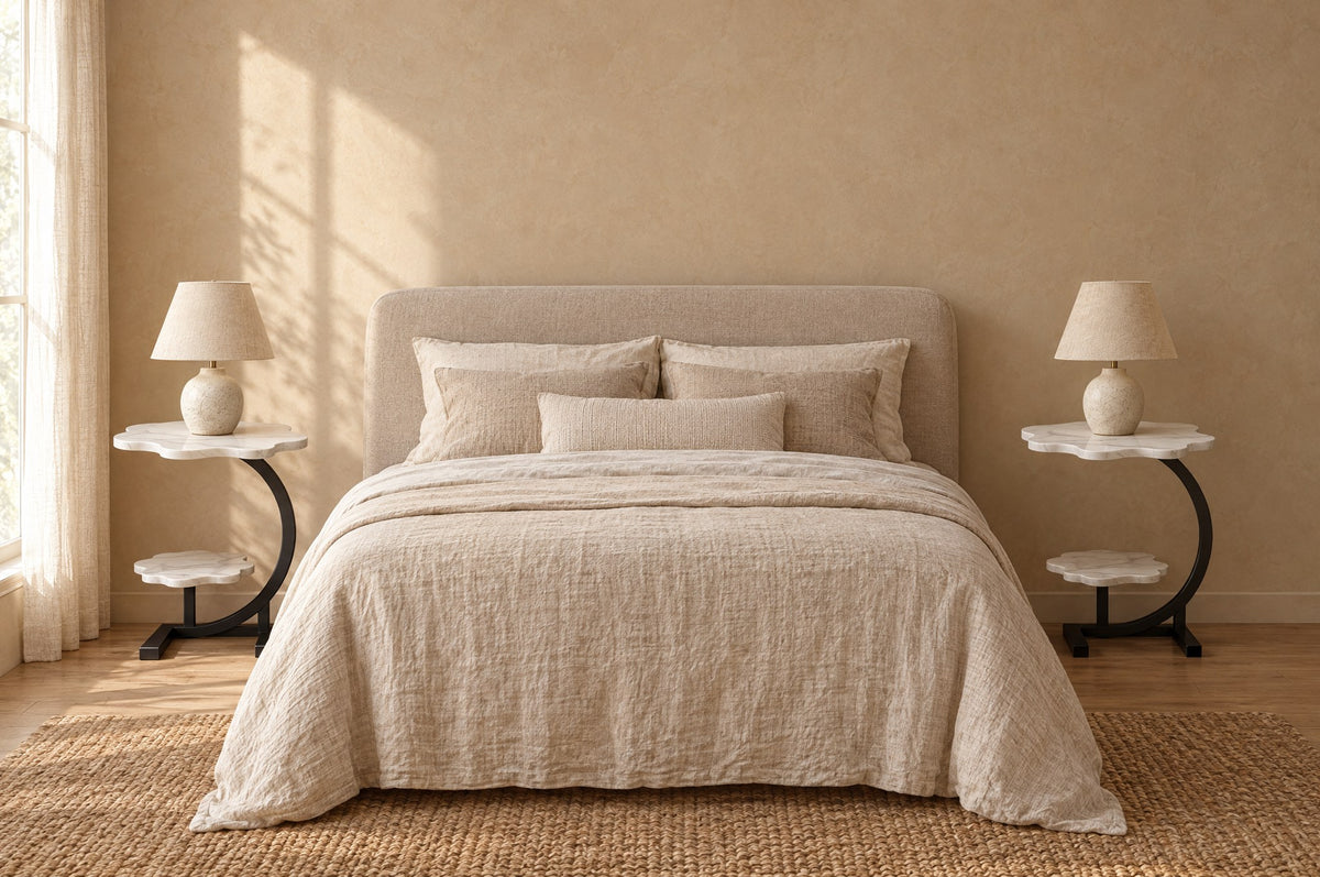 Pair of white cloud bedside tables on each side of a double bed