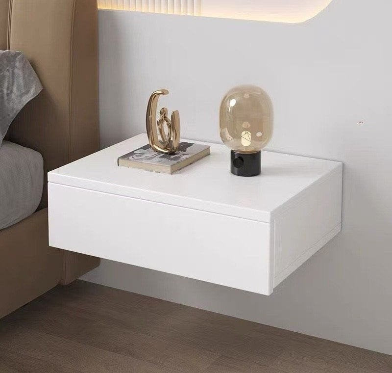 White floating bedside table in a bedroom