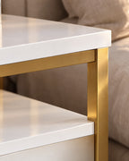 Close-up of the white top resting on the slim gold frame
