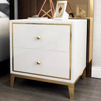 White and gold bedside table in a living space