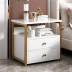 White bedside table with a gold frame in a bedroom